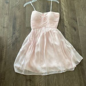 Light pink Donna Morgan bridesmaid dress
